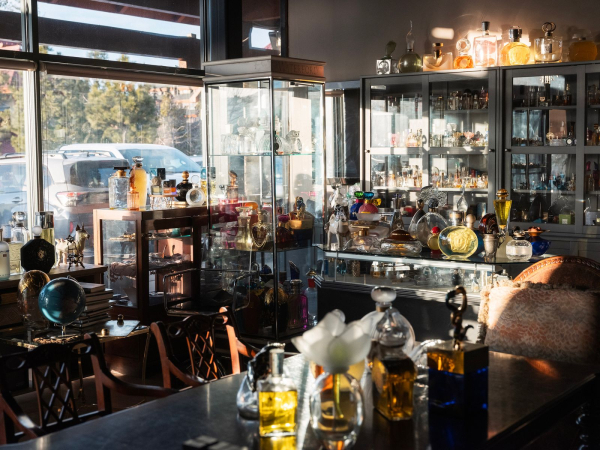 Image may contain Urban Person Bar Bottle Cosmetics Perfume Brunch and Food